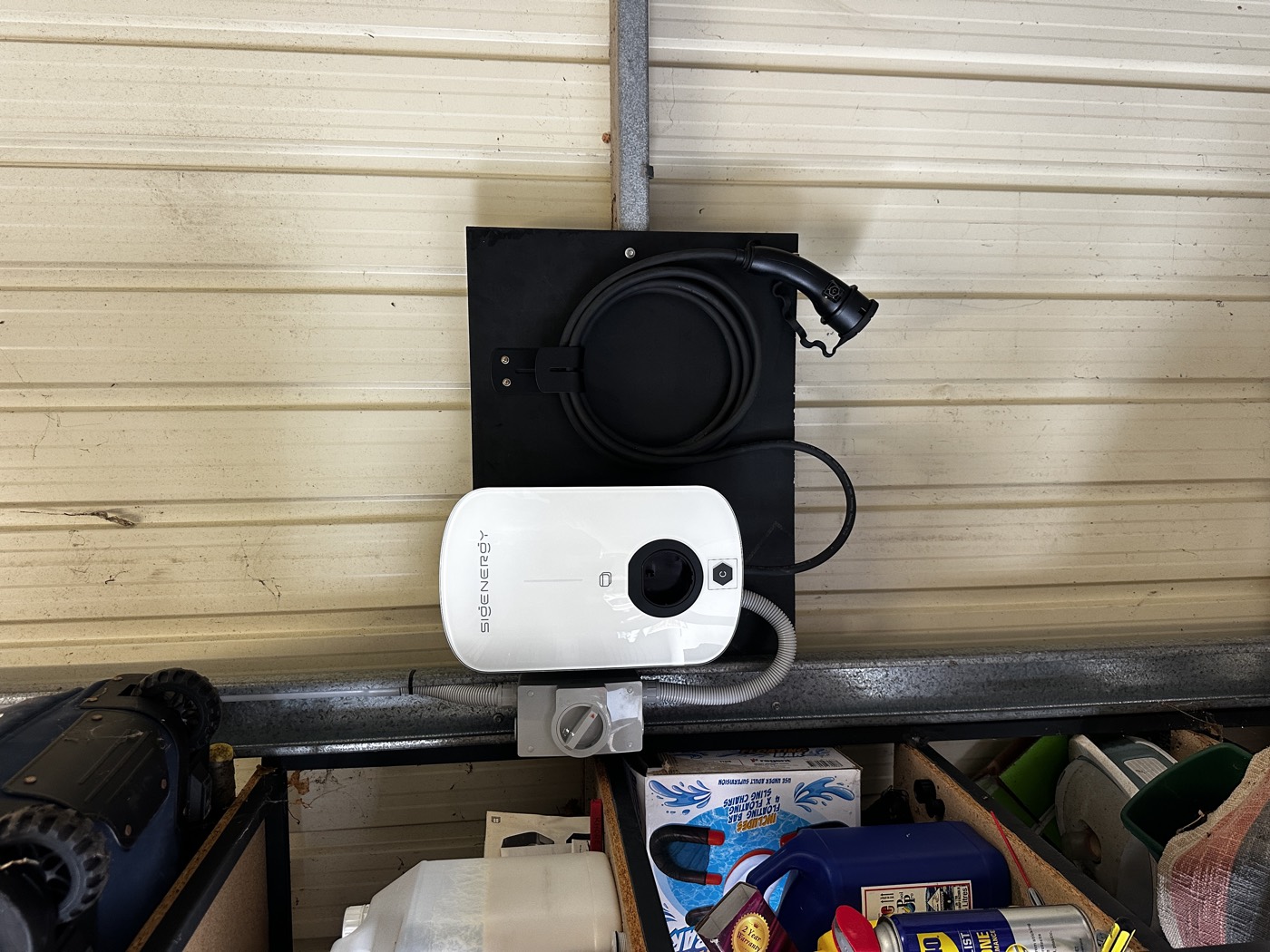 Electrician commissioning an EV charger